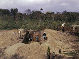 Laborers Dig a Trench into a Mound at an Archeological Excavation