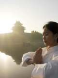 Buy Woman in Her 20s to 30s Doing Her Morning Exercise and 'Tai Chi' at AllPosters.com