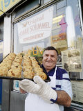 Buy Owner of the Yonah Schimmel Knishery with a Tray of Knishes at AllPosters.com