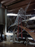 Artist Uses a Sheet of Stainless Steel as a Canvas for a Painting