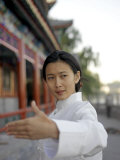 Buy Woman in Her 20s to 30s Doing Her Morning Exercise and 'Tai Chi' at AllPosters.com