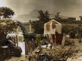 Woman Sits in Her Garden in Altea