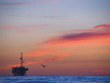 Offshore Oil and Gas Rig in the Pacific Ocean at Sunset