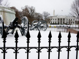 Snowfall Blankets the White House and Vintage Cannons