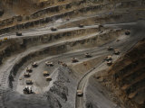 Trucks Hauling Waste Rock at Batu Hijau, a Copper and Gold Mine