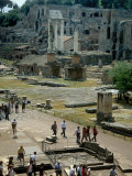 Buy Tourists Walk Through Rome's Ancient Forum with Palatine Hill Behind at AllPosters.com