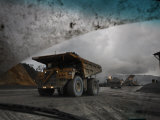 Trucks Hauling Waste Rock at Batu Hijau, a Copper and Gold Mine