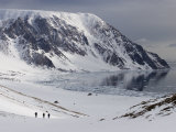 Buy Three Skiers Descend Toward a Mainly Ice Free Bay Bounded by Mountains at AllPosters.com