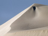Massive Coastal Sand Dune Sculptured by Relentless Ocean Winds