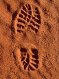 Lone Hikers Footprint in the Red Desert Sand of Outback Australia
