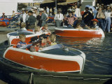 Buy Children Drive Small Motorboats in a Carnival Ride at AllPosters.com