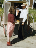 Buy Woman Buys from an Itinerant Butcher Selling Meats from a Cart at AllPosters.com