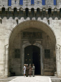 Buy Tourists Stand Outside Tall, Arched Gateway to a Seraglio at AllPosters.com