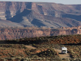 Vehicle Driving in Valley of the Gods Near Mexican Hat, Utah