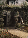 Girl Stands in Castle Garden Wearing Costume of Caux District