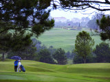 Buy Golfer and Caddy Wait Out a Monsoon Shower at Dalat Palace Golf Club at AllPosters.com