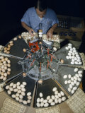 Buy Man Works with a Machine Able to Sort Eggs by Color for Uniformity at AllPosters.com