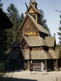 Buy Tourists Stand Outside Stave Church in Open-Air Norwegian Folk Museum at AllPosters.com