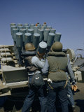 Buy Sailors Load Mortar-Type Projector During Training Operations at AllPosters.com