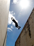 Parkour Practitioner Jumps a Building Gap in Adelaide, Sa