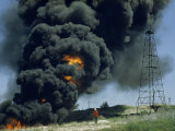 Buy Burning Waste from an Oil Well Produces a Plume of Flames and Smoke at AllPosters.com