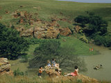 Buy People Sunbathe Near and Boat on Reservoir Water Filling Rock Canyon at AllPosters.com
