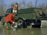 Buy Employees of Fish Hatchery Release Two-Year-Old Golden Trout at AllPosters.com