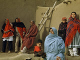 Buy Pueblo Dwellers Wear Brightly Colored and Patterned Blankets at AllPosters.com
