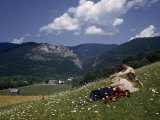 Buy Men in Flower-Carpeted Hillside Meadow Look Toward Seneca Rocks at AllPosters.com