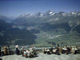 Buy Tourists Overlook Upper Engadine Valley Cradled by Alpine Peaks at AllPosters.com