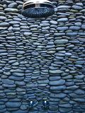 Elegant and Unusual Shower Wall Built of Volcanic River Stones