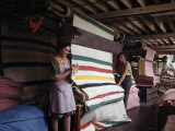 Workers Roll Striped Blankets Off Nap-Raiser Machine in Textile Mill