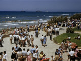 Buy Pedestrians Fill a Seaside Park on a Sunny Sabbath Day at AllPosters.com