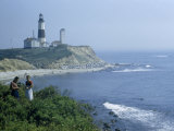 Buy People Stand on Point across Bay from Montauk Point Light at AllPosters.com