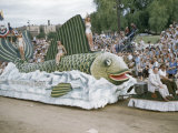 Buy Men and Women Ride on Fish Float in Aquatennial Parade at AllPosters.com