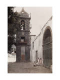 Four Children Stand Beside the Church and Bell Tower of Santo Domingo