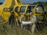 Buy Archeologists and Air Force Pilots Check their Position on a Map at AllPosters.com
