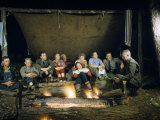Buy Park Ranger Talks to Tourists Sitting Beside a Campfire at Night at AllPosters.com