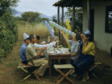 Buy Members of an Archeological Expedition Celebrate at a Birthday Party at AllPosters.com