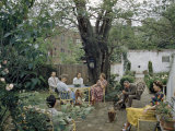 Buy Men and Women Relax in Quiet Backyard Garden at AllPosters.com