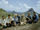 Buy Archeologists Examine Ancient Petroglyphs at AllPosters.com