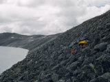 Buy Scientists Struggle to Carry a Canoe across Boulders to a Crater Lake at AllPosters.com