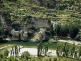 Buy Small Farming Village Hugs a River's Edge Below Castle Ruins at AllPosters.com