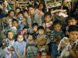 Buy Children Crowd Together with their Pets for a Blessing of the Animals at AllPosters.com