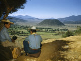 Buy Farmers Sit in Shade Overlooking Fields and Cinder Cone Volcanos at AllPosters.com