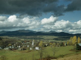 Buy Stowe Sits in a Valley Surrounded by Mountains at AllPosters.com