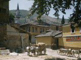 Buy Horses Pull Carts and Stand and Wait in Dusty Courtyard at AllPosters.com