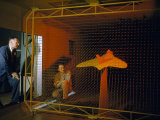 Buy Scientists Watch Grid Show Airflow over Model Skyray in Wind Tunnel at AllPosters.com