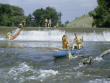Buy Men Paddle into Fast Waters While Others Slide Canoe Down Waterfall at AllPosters.com