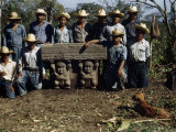Buy Archeological Workers Pose with a Stone Altar Found at La Venta at AllPosters.com